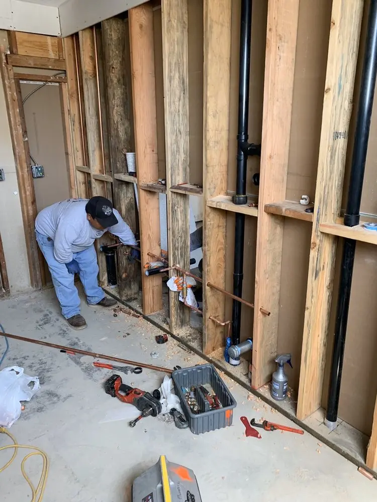 Commercial rough-in plumbing for Water Heater Replacement in Yates Village